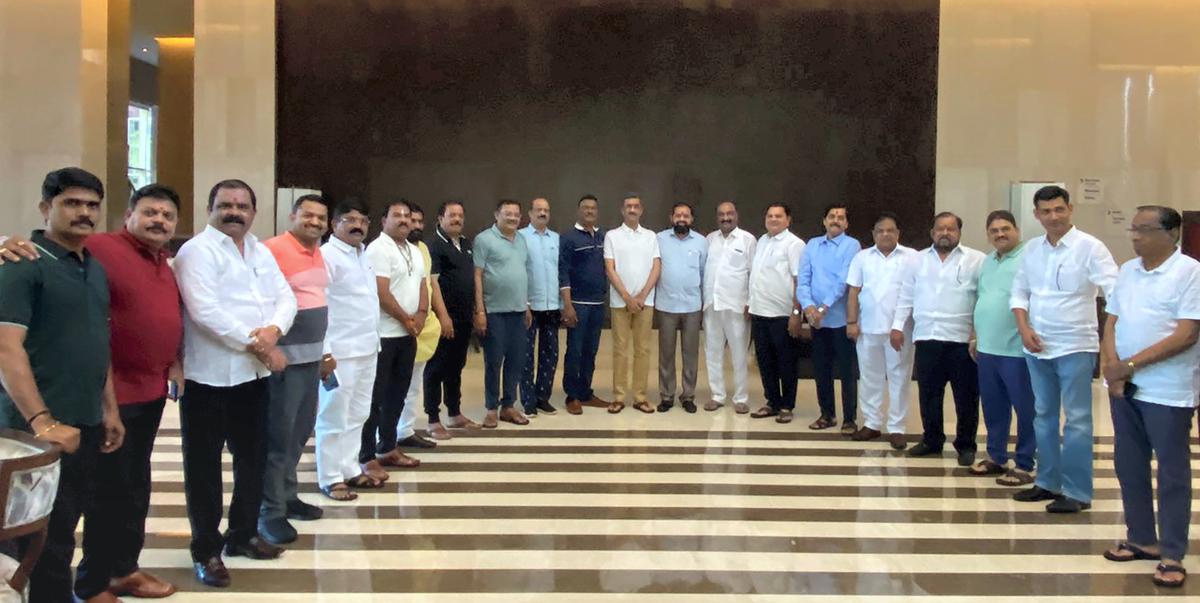 Shiv Sena leader Eknath Shinde along with other rebel Shiv Sena MLAs at a hotel in Guwahati, Friday, on June 24, 2022. 