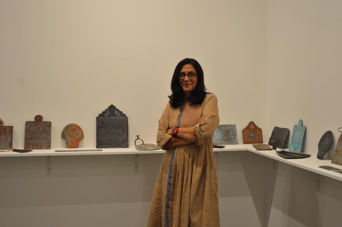 Artist Pushpamala N and exhibits from her solo show ‘Epigraphica Indica’