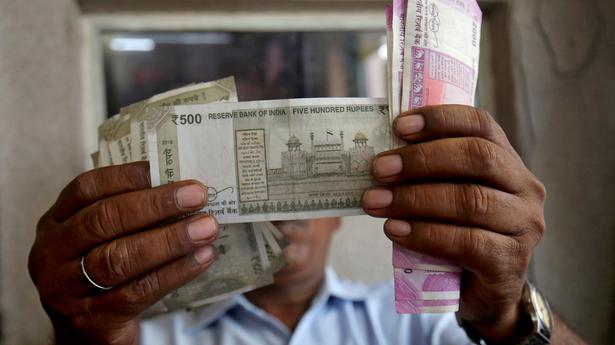 Rupee recovers from record low, inches higher by 9 paise against U.S. dollar in early trade
