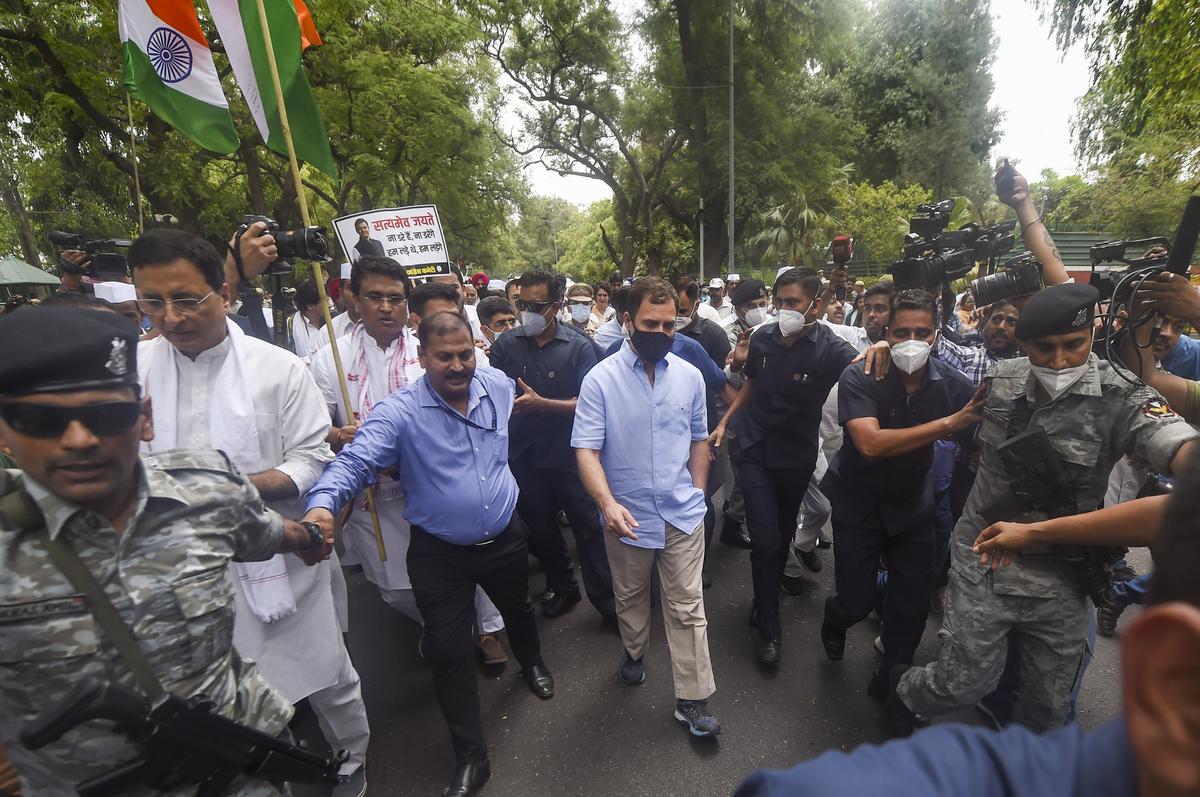 Congress leader Rahul Gandhi leaves for ED office amid protests by party workers, after being summoned for questioning in the National Herald case, in New Delhi on June 13, 2022.