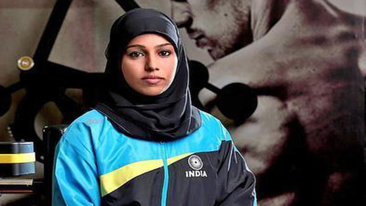 Image result for Majiziya Bhanu, a hijab-clad power-lifter from Kerala