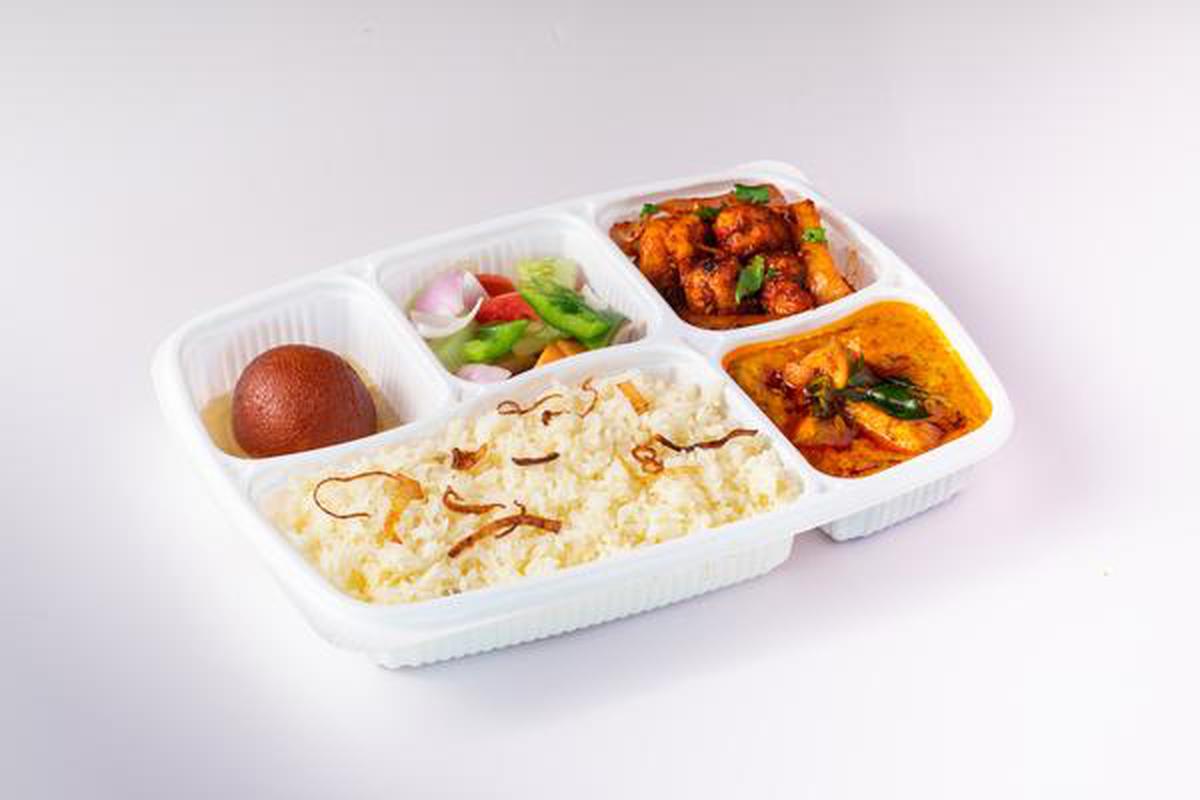 Meal trays include options such as fluffy schezwan fried rice and Hakka noodles, crunchy with vegetables