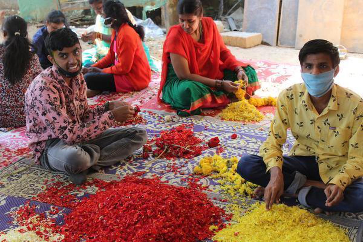 People with intellectual disabilities making skin-friendly Holi colours for Craftizen Foundation