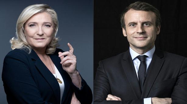 Emmanuel Macron leads Marine Le Pen in French election battle