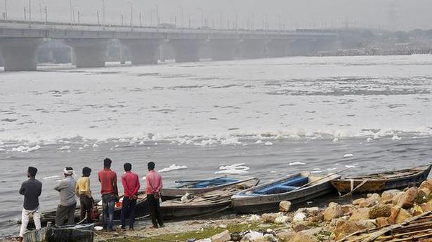 Govt. sprays water, uses boats to clear froth in Yamuna