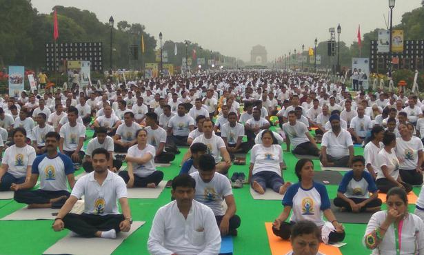 People taking part ina yoga event in Rajpath on June 21, 2018.