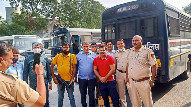 Delhi Police initiates inquiry after cops seen clicking photos with Sushil Kumar