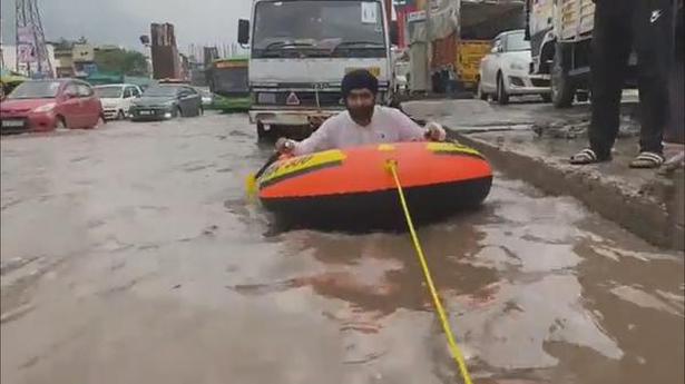 BJP leader goes ‘rafting’ on waterlogged Delhi road, ‘thanks’ Kejriwal