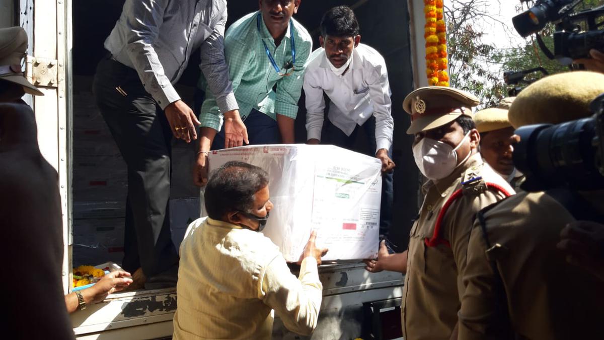 Cartons with COVID-19 vaccine vials being unloaded from a deep freezer van at State Vaccine Centre in Telangana Health Campus, Hyderabad on Tuesday.