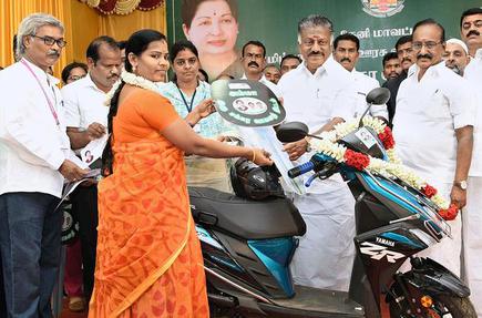 OPS distributes two-wheelers to women - The Hindu