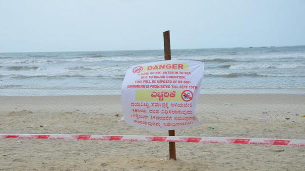 Safety nets and red flags placed at Malpe beach