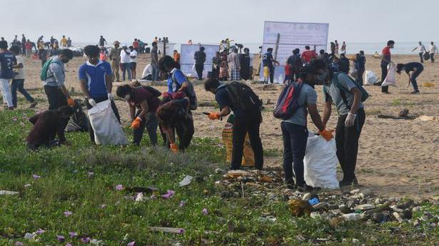 Volunteers collect waste during mega beach cleaning drive