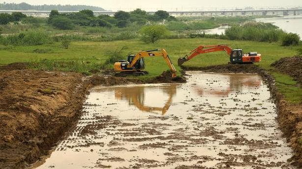 Work on to remove sand shoal at mouth of canals