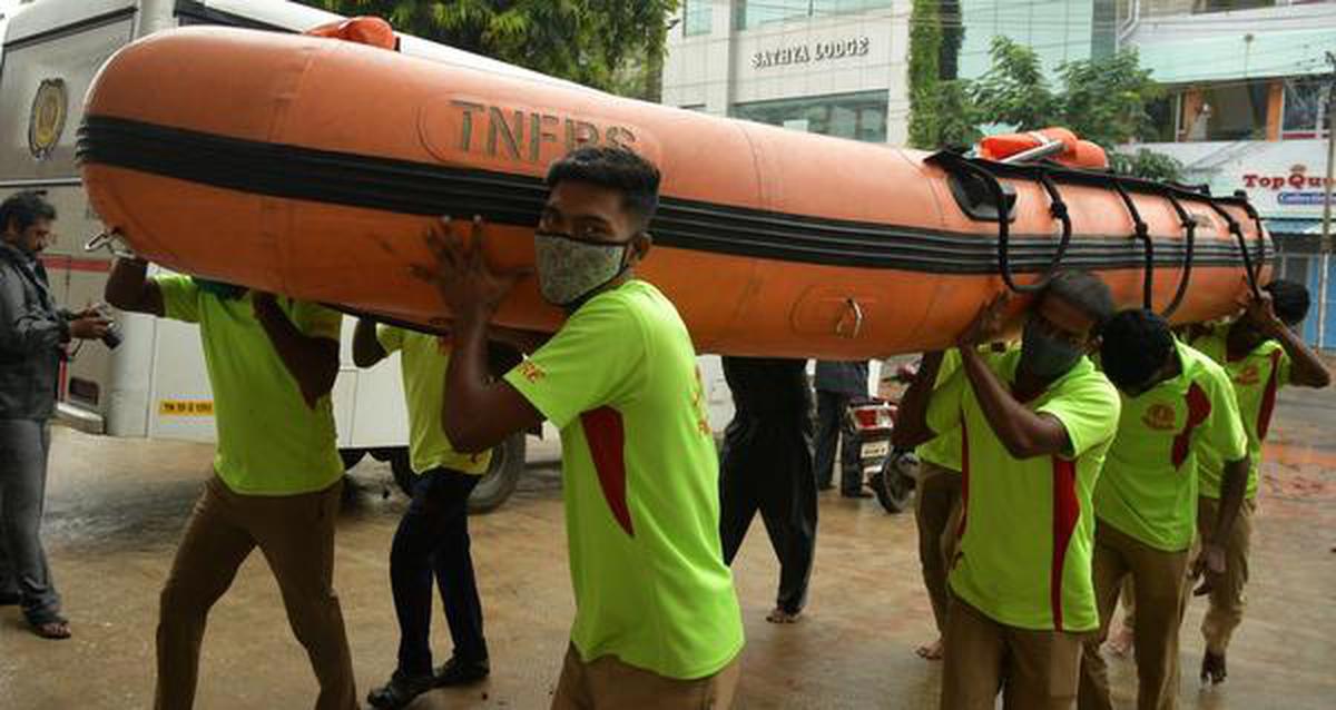 Tamil Nadu Fire and Rescue Services personnel leave for various parts of Nagapattinam district equipped with rafts and other emergency equipment on Wednesday.