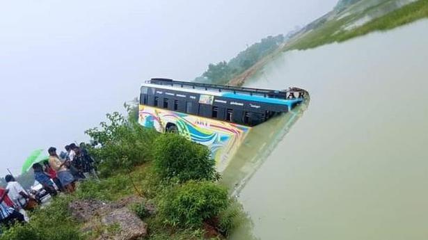 Bus plunges into field
