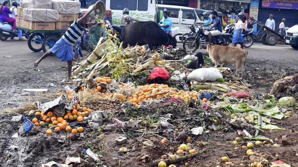 Garbage dumped near Gandhi Market causes traffic snarl