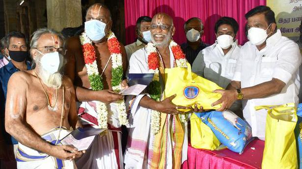 Cash dole, grocery items distributed to temple priests in Tiruchi