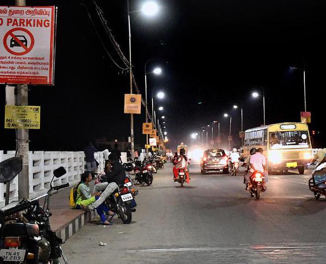 A caution board put up by the city police warns two-wheelers and four-wheelers not to park on the Cauvery bridge in Tiruchi.