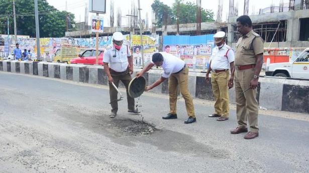 City police take up temporary measures to fix potholed roads