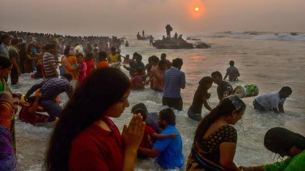 Devotees take holy dip in sea