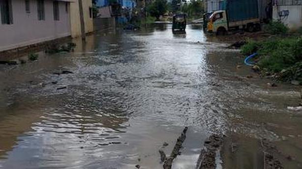 Junnasandra residents forced to wade through sewage, rain water