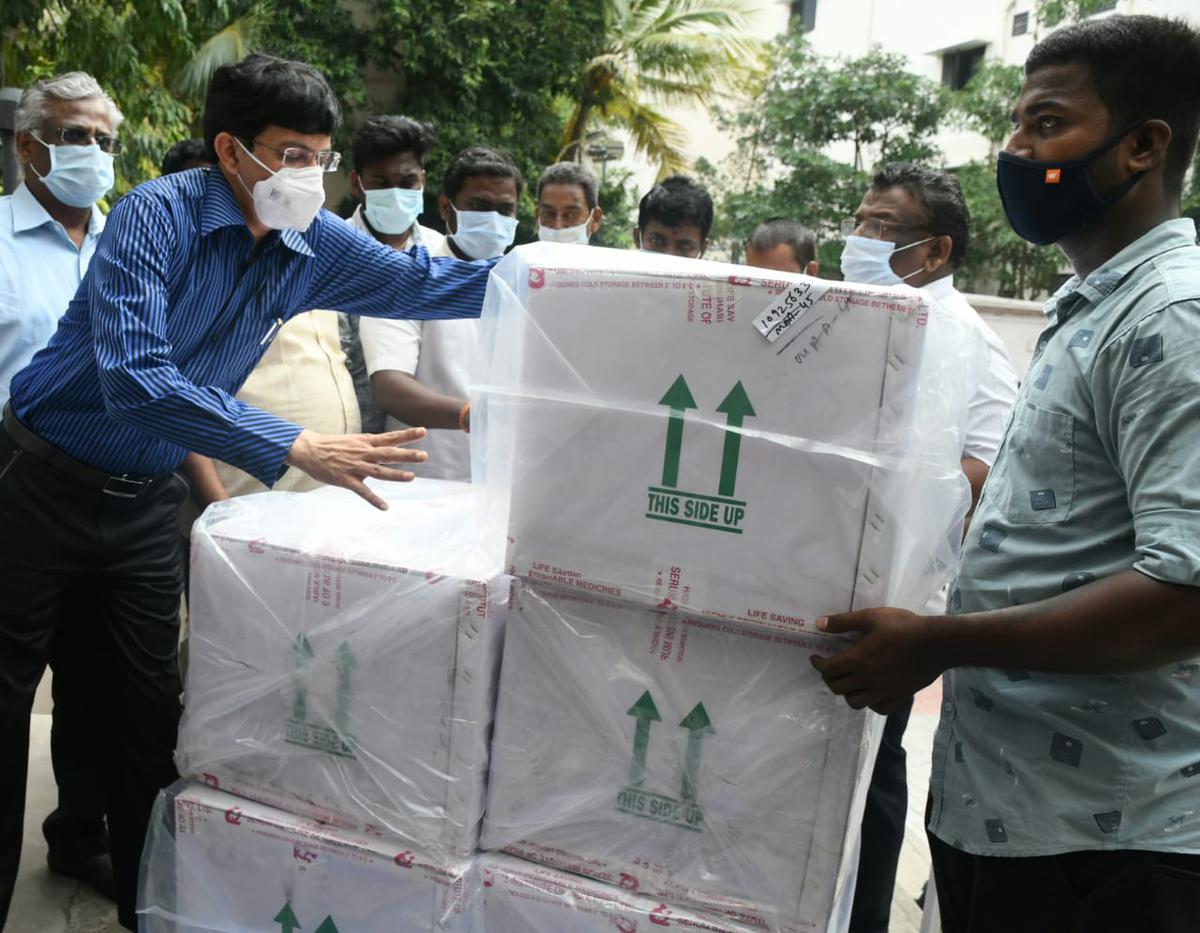 Tamil Nadu Health Secretary J. Radhakrishnan overseeas as COVID-19 vaccines are being unloaded at the Department of Public Health vaccine store at Teynampet in Chennai on Tuesday.