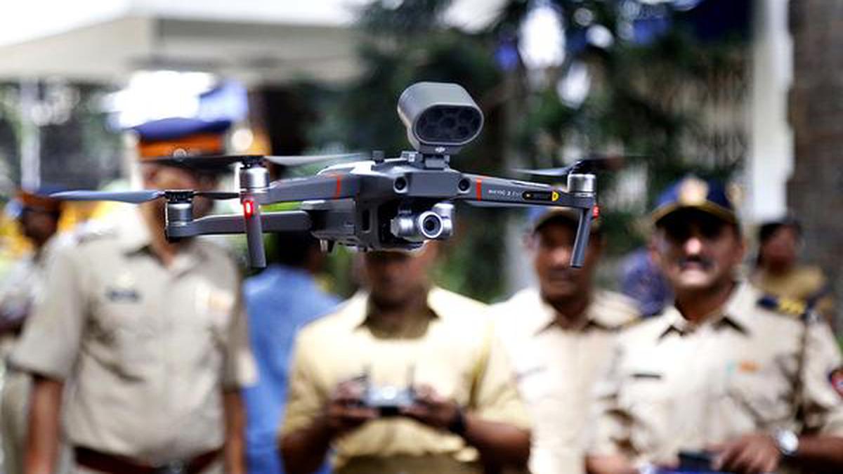 In a first, police use drone-mounted speaker to warn crowds at ED office -  The Hindu