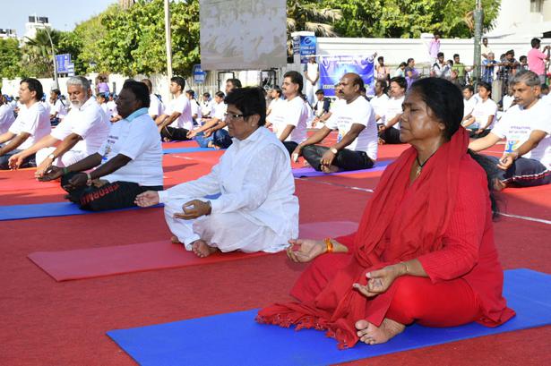 Yoga demonstration at Beach Road in Puducherry on June 21, 2018.