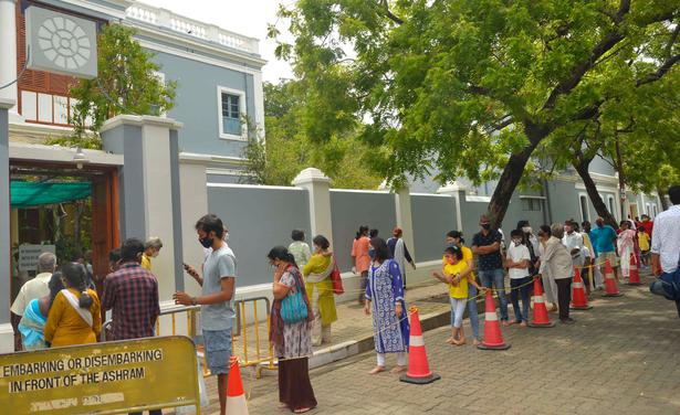 Devotees gathered at the Sri Aurobindo Ashram in Puducherry to take part in the 150th birth anniversary celebration of Sri Aurobindo on August 15, 2021.