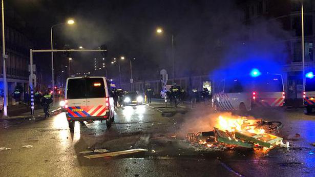 Dutch police detain 30 after COVID riots