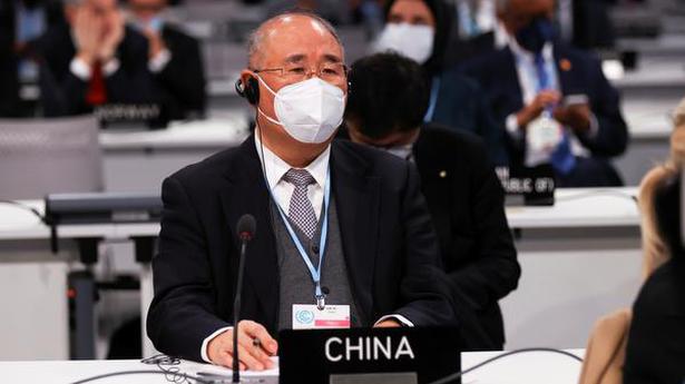China envoy defends emissions, criticizes U.S. under Trump