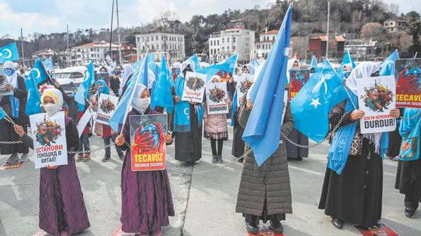 Uighur women stage a march in Istanbul against China camps
