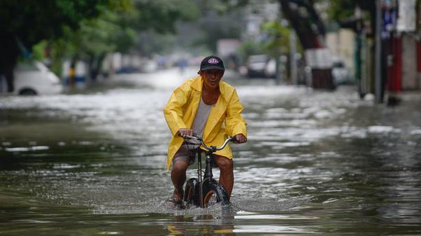 Monsoon rains flood Philippine villages, thousands evacuate