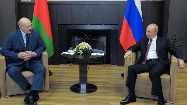 As Putin hosts Lukashenko, U.S. hits Belarus with sanctions
