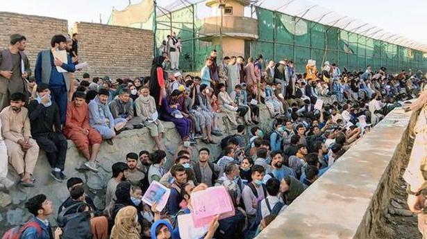 Afghans race to flee Taliban regime