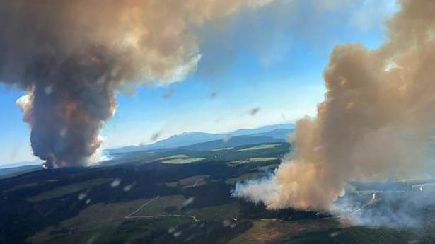 Wildfires rage as heat wave stifles western U.S., Canada