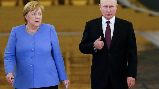 Merkel asks Putin to free Kremlin critic Navalny