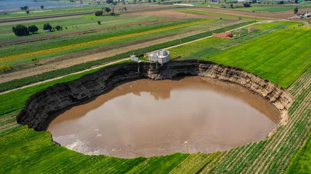 Watch: Giant sinkhole at Mexico farm swallows family home
