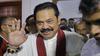 Newly appointed Sri Lankan Prime Minister Mahinda Rajapaksa leaves a Buddhist temple after meeting his supporters in Colombo, Sri Lanka, Friday, Oct. 26, 2018