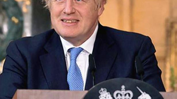Learn to live with virus, Johnson tells Britons