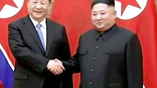 Xi, Kim vow to strengthen ties