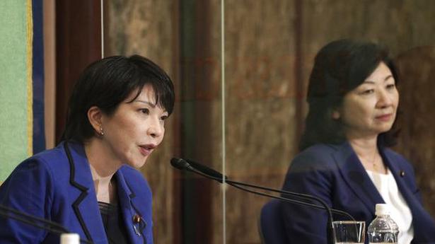 Two women in Japan party leadership race get mixed reactions