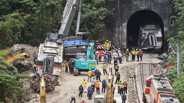Workers clear last train car from deadly crash site in Taiwan
