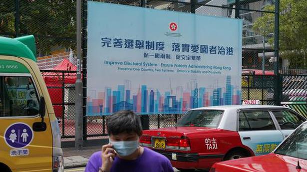 Hong Kong legislature approves China loyalty laws