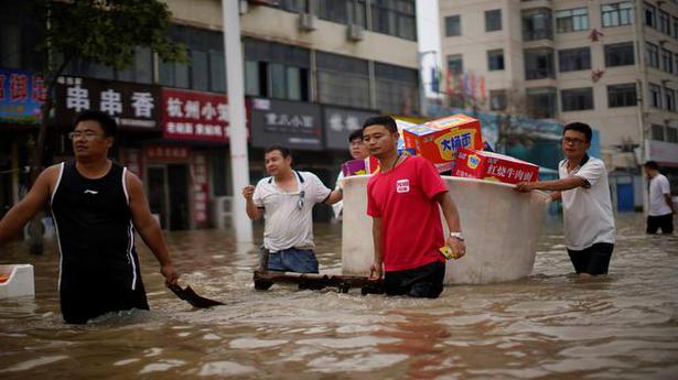 Deaths in central China floods rise to 51, losses mount to $10 billion