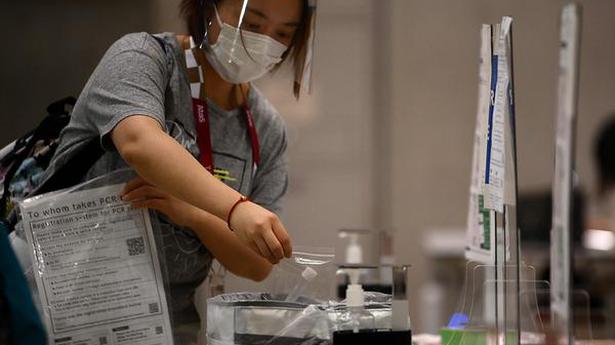 Japan to ramp up COVID-19 tests as it battles worst wave of infections