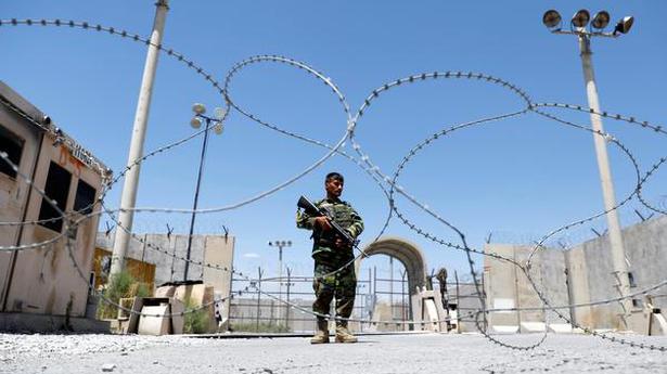 U.S. vacates key Afghan base, pullout target now ‘late August’