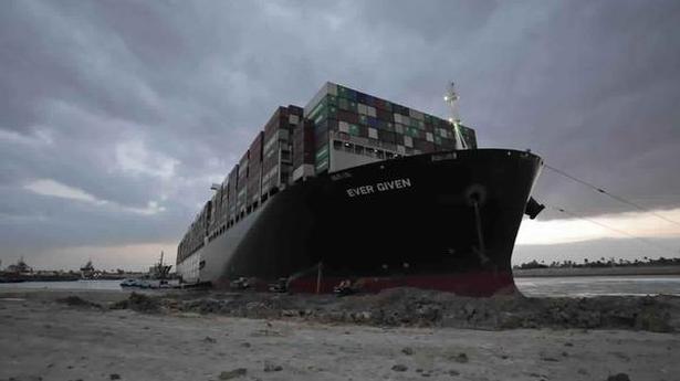 Suez Canal says deal reached to free seized vessel