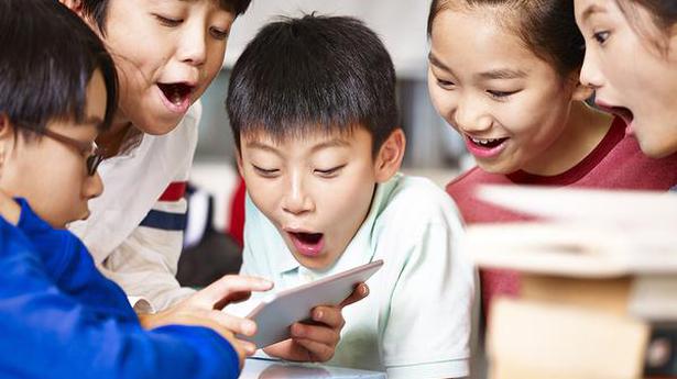 China cuts time minors can spend on online games