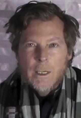 This image made from video released by the Taliban on Wednesday, Jan. 11, 2017 shows an Australian identified as Timothy Weekes making a statement on camera while in captivity.